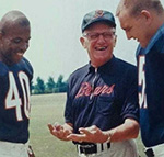George Halas coachin Gale Sayers and Dick Butkus